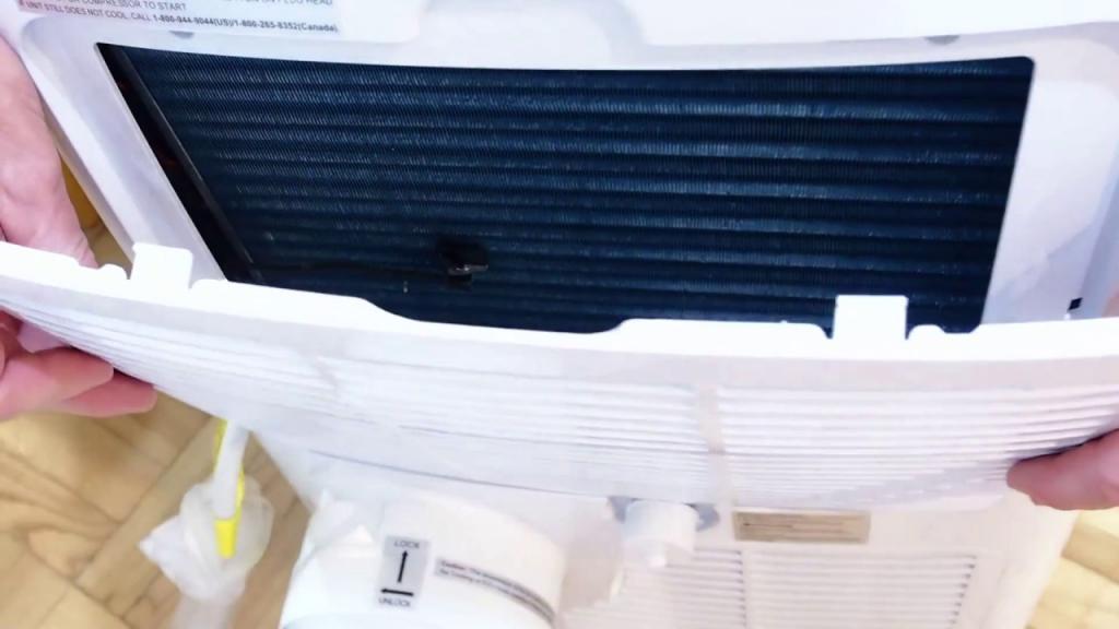 How to clean the filter in Frigidaire air conditioner - YouTube
