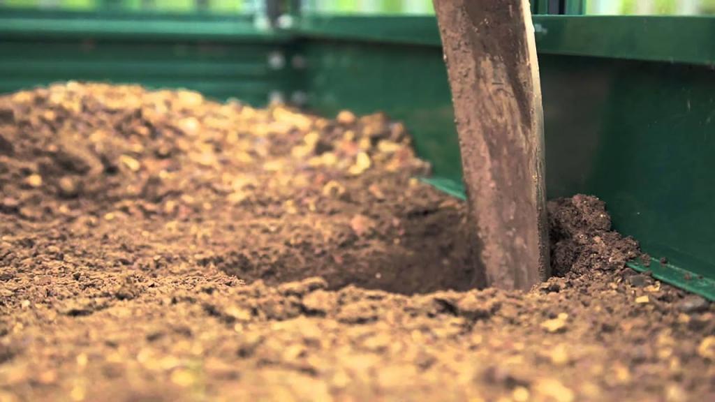 Harrod Horticultural Greenhouses - Installing ground anchors for greenhouse... - YouTube