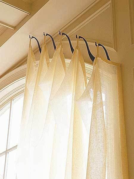 genius idea for odd shaped/sized windows; hooks instead of a rod | Arched window treatments, Window coverings, Arched windows