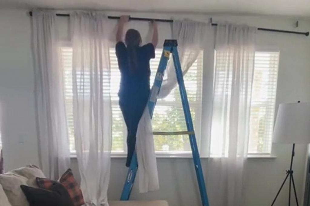 Woman discovers 'genius' hack to hang curtains in your home WITHOUT having to drill holes into your wall