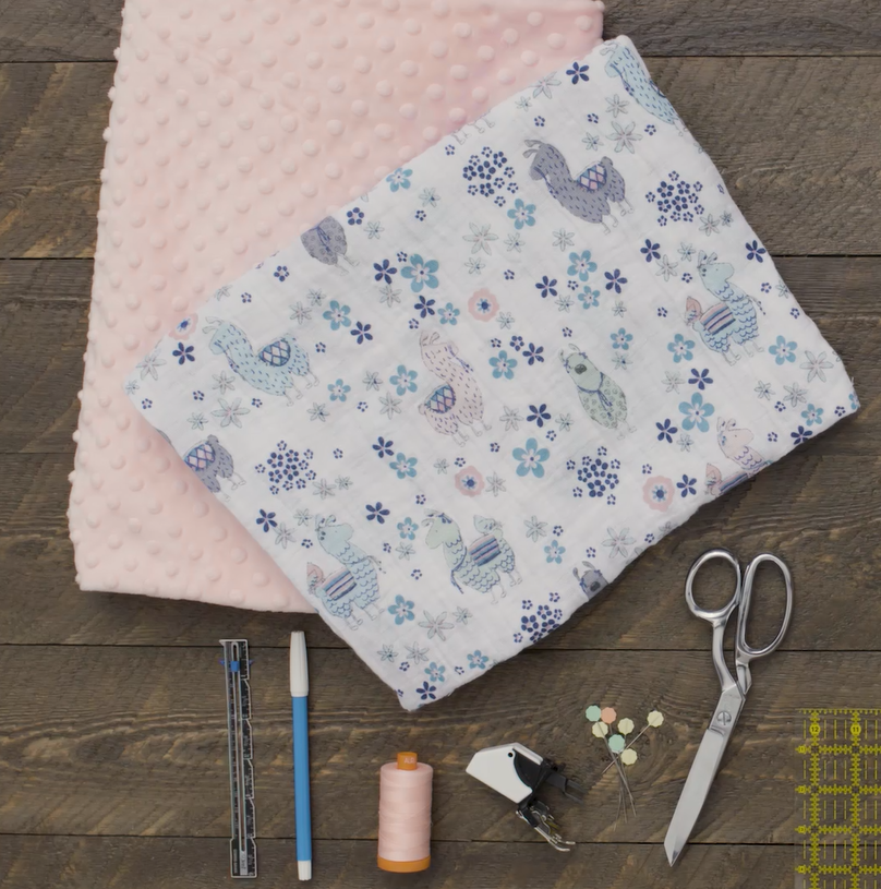 Self Binding Baby Blanket Tutorial | Learn how to create a quick and easy self binding baby blanket in a few steps using Minky and Double Gauze! This project makes a perfect