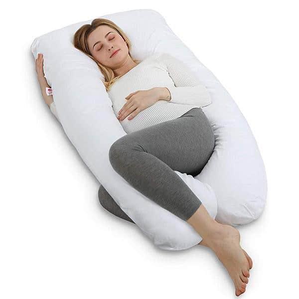 How To Sleep With A Pregnancy Pillow (6 Ways) - Terry Cralle